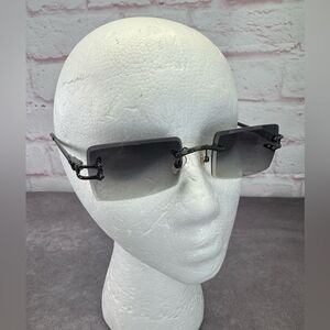 James Oro Black Tint Gunmetal Black Authentic II Rimless Sunglasses
